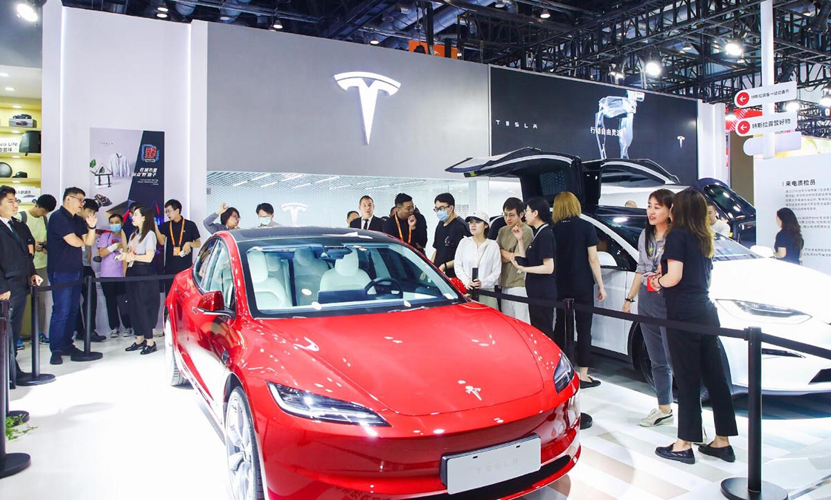 Tesla's Redesigned Model 3 Takes Center Stage at Beijing Trade Fair in China - Car News - 2