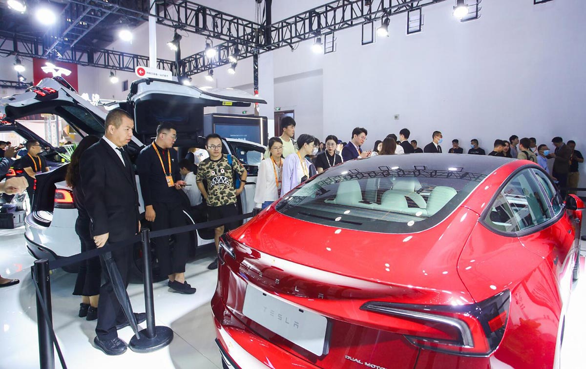 Tesla's Redesigned Model 3 Takes Center Stage at Beijing Trade Fair in China - Car News - 5