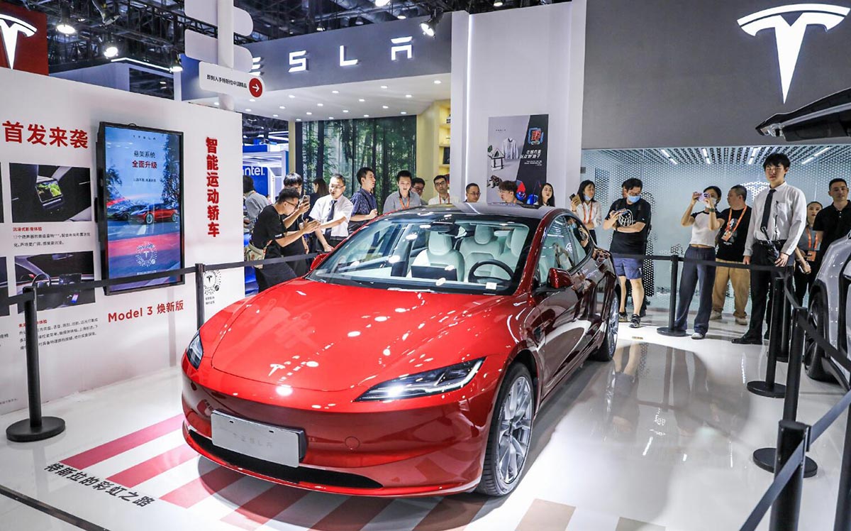 Tesla's Redesigned Model 3 Takes Center Stage at Beijing Trade Fair in China - Car News - 1